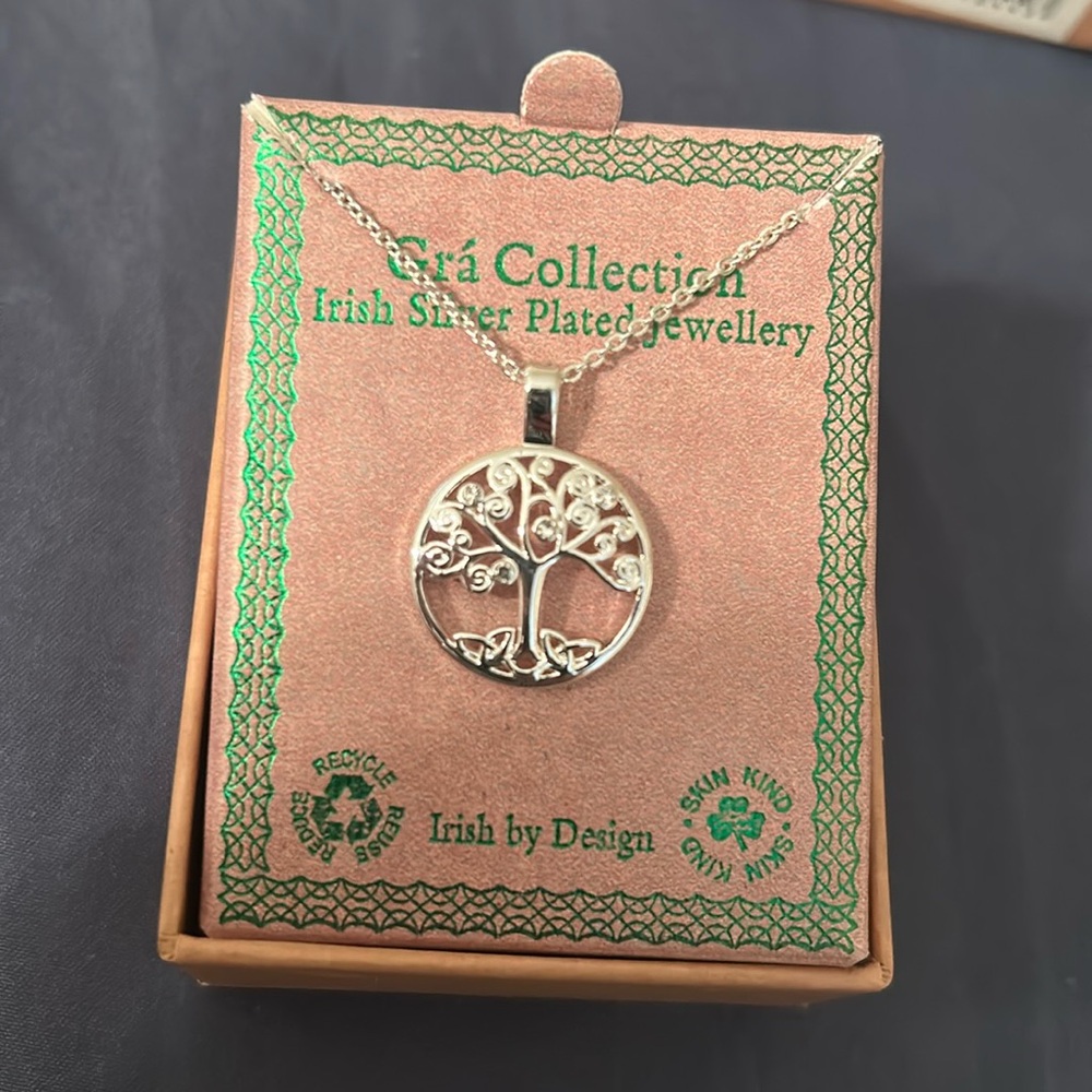 New in box. Celtic tree of life necklace.